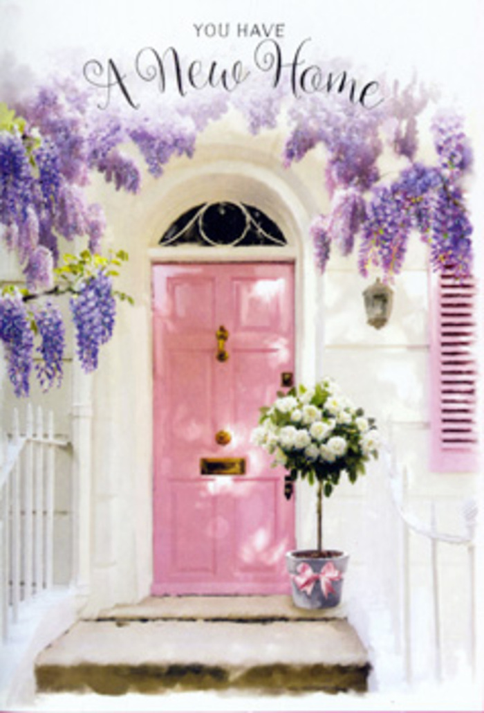 The photograph captures a peaceful, storybook-like doorway in West Hampstead, perfectly styled for the moment when a house first becomes a home. A soft pink door stands at the centre, its colour reminiscent of rose petals and its finish smooth and muted, absorbing the ambient light. Flanking the door, bright whitewashed walls enhance the sense of freshness and newness, mirroring the clean lines of many local terraces tucked just off West End Lane. Above, a cascade of wisteria drapes downward in voluminous strands of lavender bloom. Each elongated cluster hangs like a tassel, their pastel tones deepening where the blossoms bunch more densely, creating delicate shadows against the wall. The twisting stems and scattered leaves conjure the feeling of a mature, lovingly tended plant, perhaps the pride of a long-time gardener on a quiet side street. To one side, a shutter painted in a co-ordinated blush shade bridges window and door, tying the architecture together with a soft brush of colour. On the stone step below rests a grey metal bucket, modest yet full of character, pressed into service as an impromptu vase. From it rises a sumptuous bouquet of white and cream roses, the blooms at differing stages of openness, some cupped, others fully unfurled. The petals look almost velvety, delicately curled at the edges, while sprigs of green foliage weave among them, adding movement and depth. A satin pink ribbon ties snugly around the bucket's base, its subtle gleam catching the light. The composition feels calm and optimistic, as if someone has placed this arrangement at the entrance of their new West Hampstead flat to greet friends, mark a fresh chapter, and fill their threshold with softness, joy, and an enduring sense of welcome.